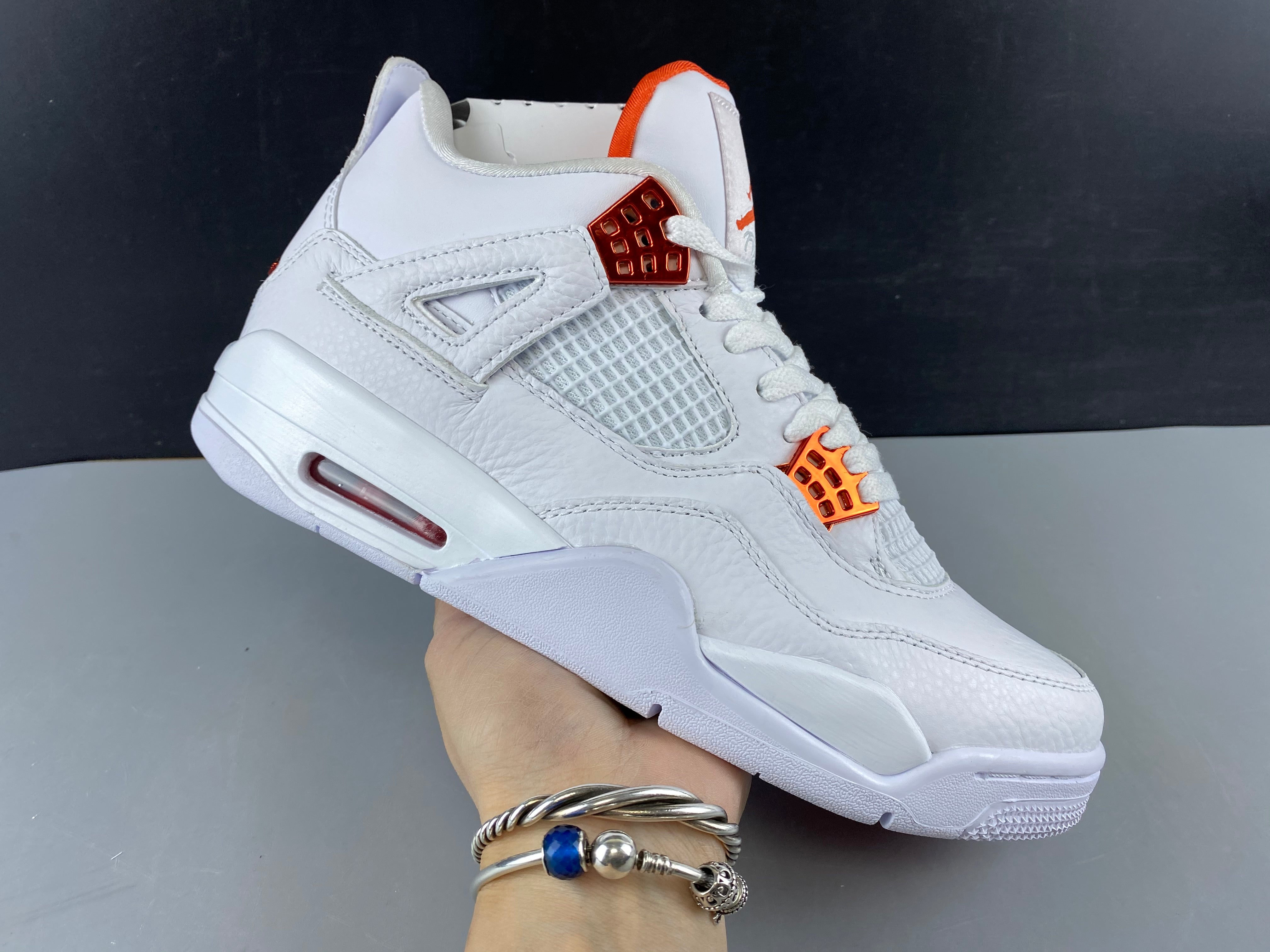 Jordan 4 Retro Metallic Orange