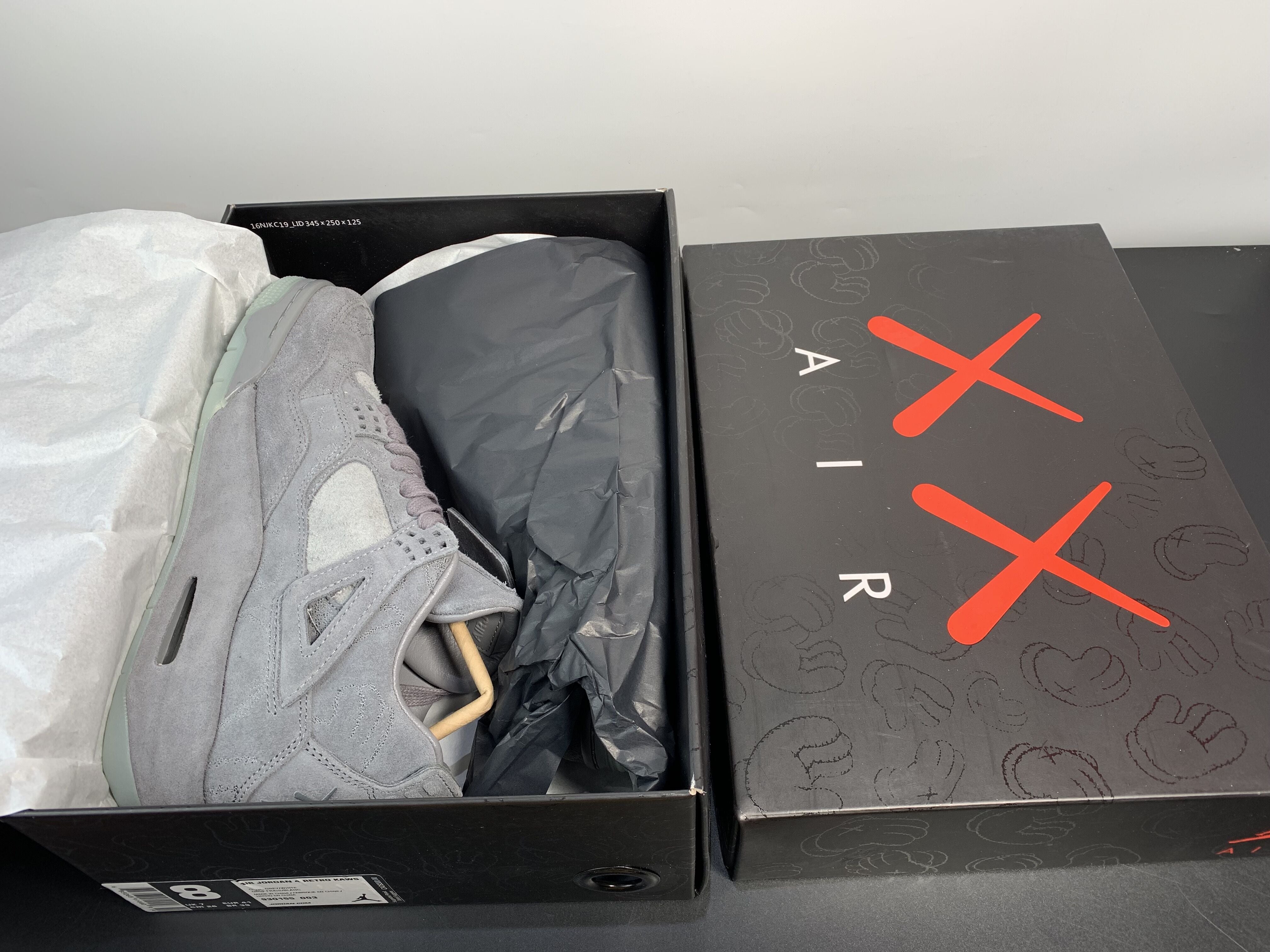 KAWS X JORDAN 4 COOL GREY