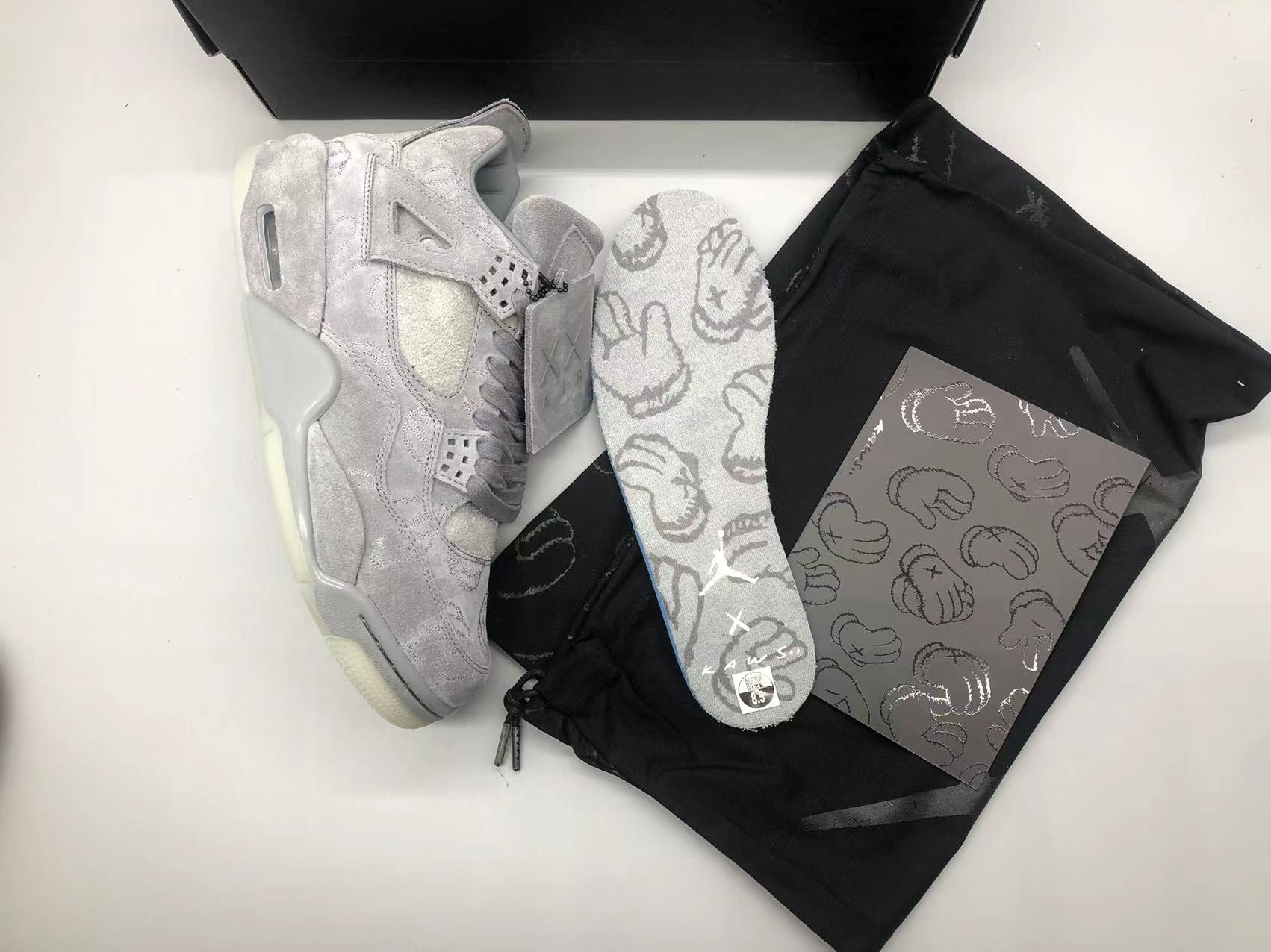 KAWS X JORDAN 4 COOL GREY