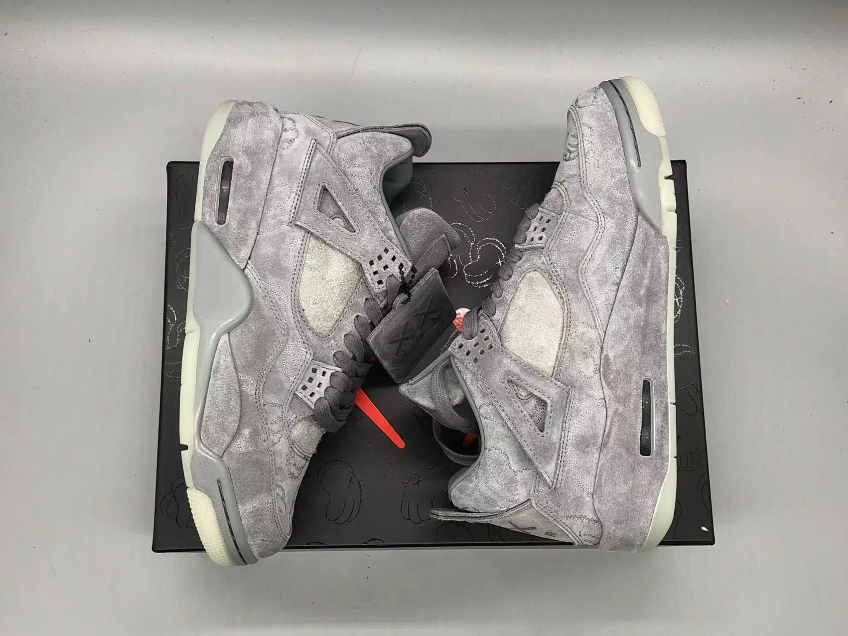 KAWS X JORDAN 4 COOL GREY